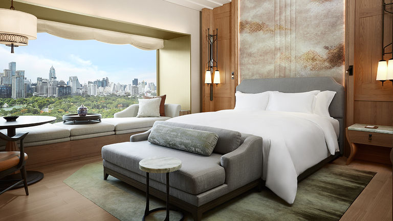 Dusit Thani Bangkok looks over Lumpini Park, a 142-acre green space in Bangkok.