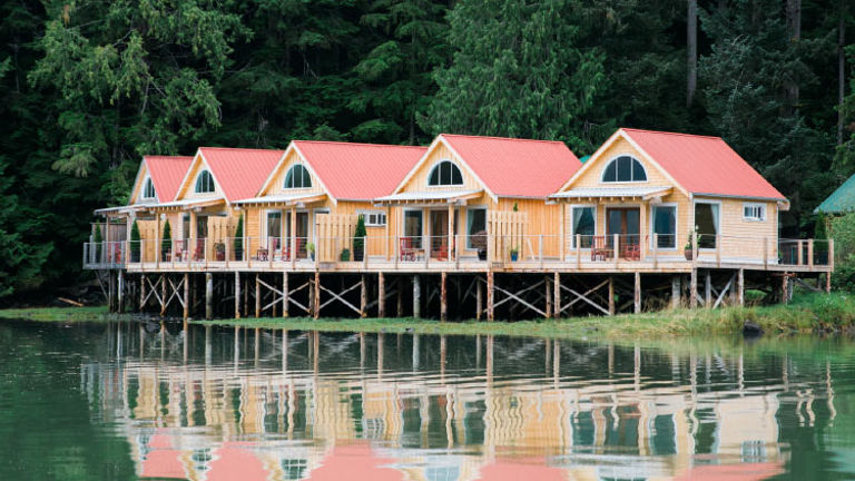 Guests can watch the tide ebb and flow from a Nimmo Bay Resort cabin. // © 2017 Nimmo Bay Resort