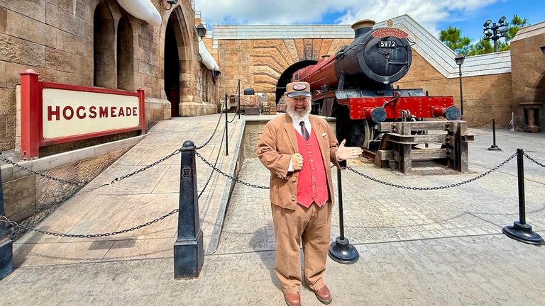 In Hogsmeade, Harry Potter fans can pose for photos in front of the Hogwarts Express with a wizarding conductor.