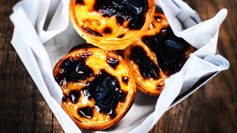Learn about Lisbon's egg custards on a food tour with an operator such as Culinary Backstreets. // © 2017 iStock