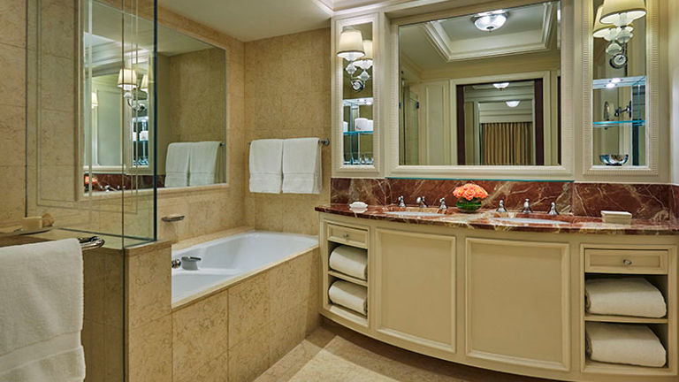 One of two bathrooms in the Ambassador Suite, which includes a soaking tub and a separate shower // © 2015 Christian Horan/Four Seasons Hotel Doha
