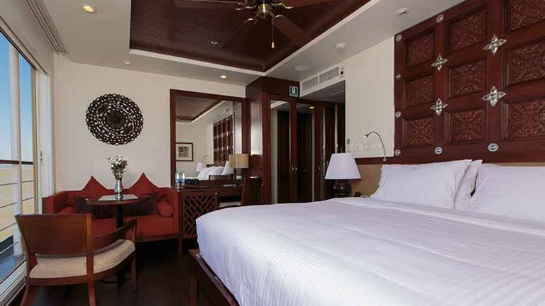Stateroom on Avalon Myanmar feature large sliding-glass windows. // © 2016 Avalon Waterways