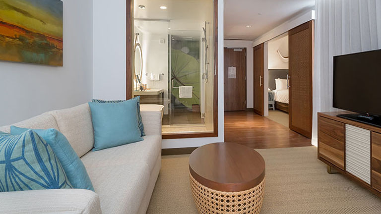 The living room of a 450-square-foot Ocean View Suite // © 2017 Hyatt Centric Waikiki Beach