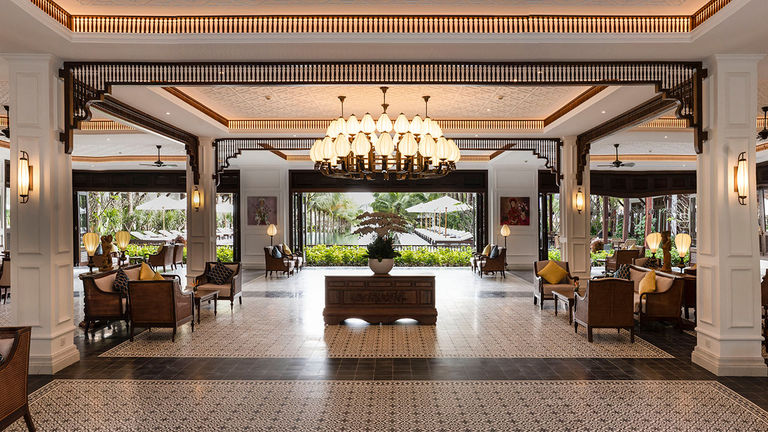 The resort’s lobby features antique tiles and teak wood touches.