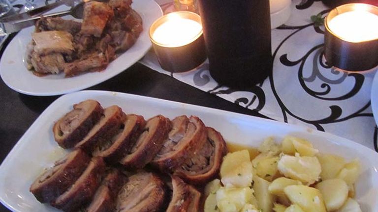 Traditional Serbian fare, such as roasted pork and potatoes, was served at the event. // © 2016 Elizabeth Dupuis