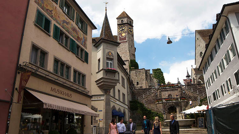 Wedding celebrators go for a stroll following the ceremony in Rapperswil’s hilltop church. // © 2018 Ben McBee