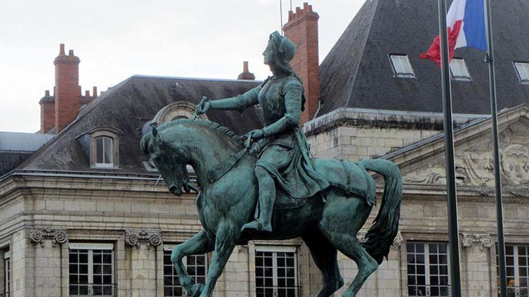 With this towering statue, the people of Orleans celebrate Joan of Arc heading into battle atop a prancing steed. // © 2017 Creative Commons user izrailit